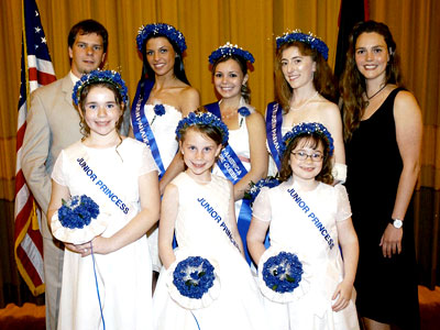 Miss German-America Nicole Radske poses with princesses Karina Scherbner and Doreen McVeigh, Junior Princesses Jamie Lartin, Grace Arnold, and Catherine Rabus (from left). They were congratulated by Lars Halter, General Chairman of the Steuben Parade Committee, and Ingrid Gartner, Chairwoman of the Queens Committee.
