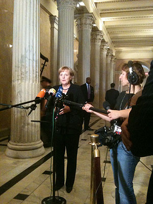 After her speech, Chancellor Merkel addressed the German press inside the Capitol